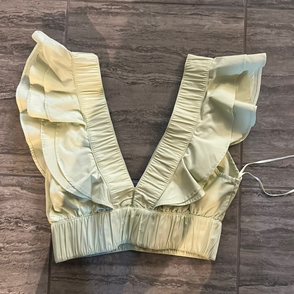 light green cropped top